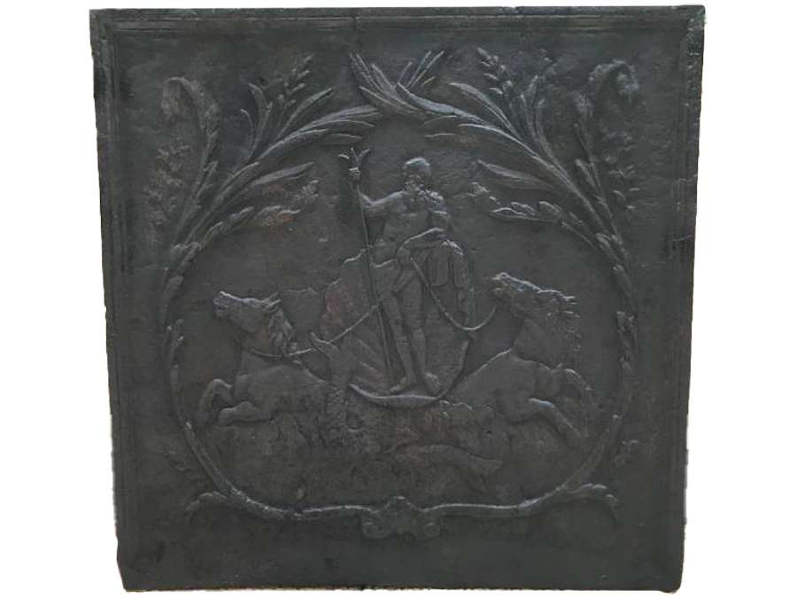 Ancient fireplace insert in late 18th century cast iron