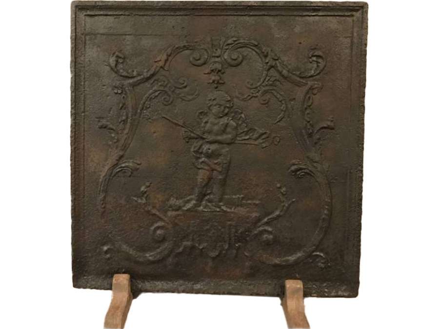 Ancient fireplace plate in cast iron 18 th Louis XVI