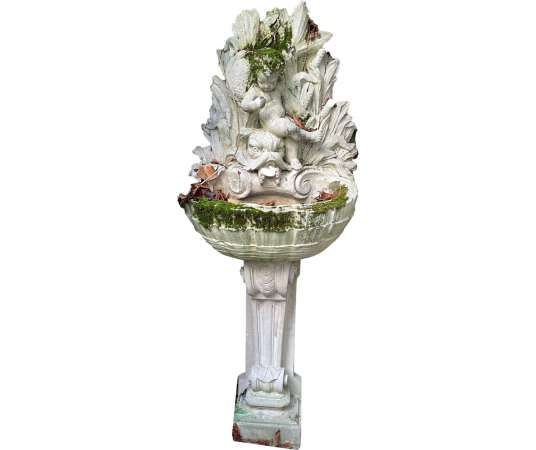 PRETTY OUTDOOR FOUNTAIN IN RECONSTITUTED STONE IN THE LOUIS XV STYLE DECORATED WITH A CHILD...