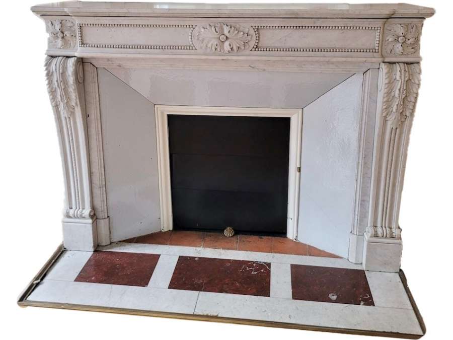 beautiful old Louis XVI style fireplace with rosettes and acanthus and pearl decorations