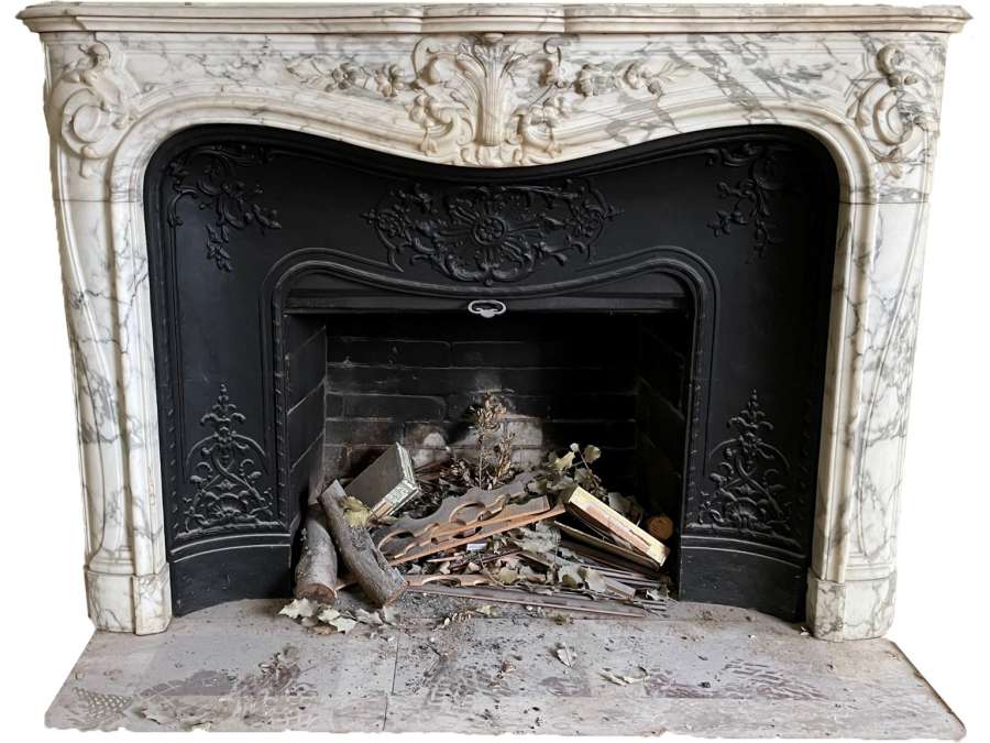 beautiful old Loui XV style fireplace with voluptes made in arabescato marble