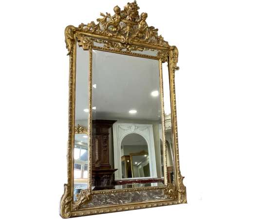Magnifique miroir ancien biseauté au mercure de style Louis XVI a pare closes datant de la fin du...