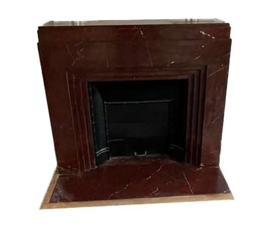 Pretty antique fireplace in rouge griotte marble, art deco period