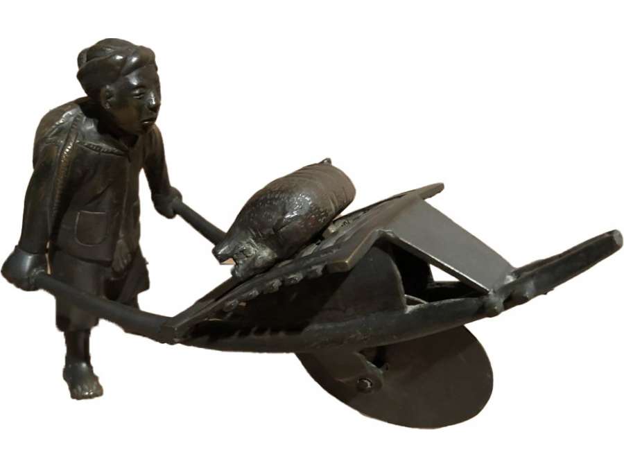 Sculpture of an Asian Pushing a Wheelbarrow 19th Century
