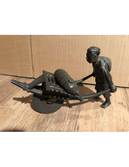 Sculpture of an Asian Pushing a Wheelbarrow 19th Century-Bozaart