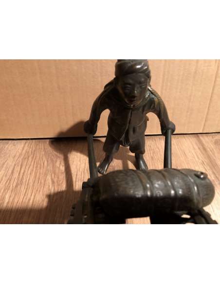 Sculpture of an Asian Pushing a Wheelbarrow 19th Century-Bozaart