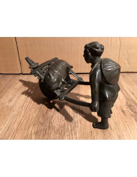 Sculpture of an Asian Pushing a Wheelbarrow 19th Century-Bozaart