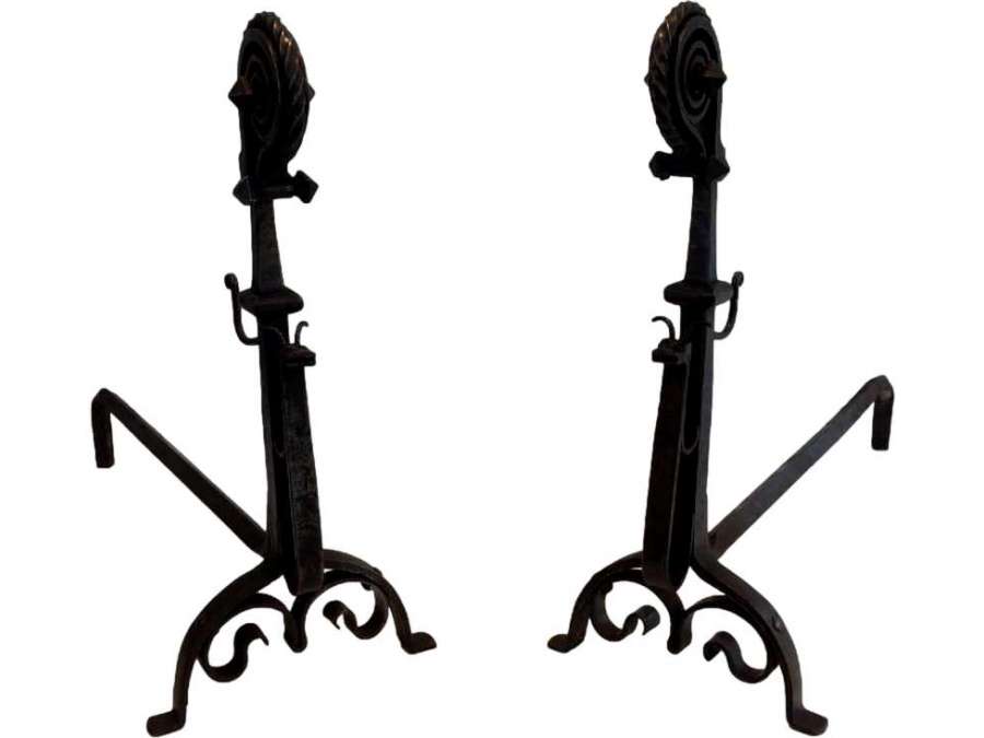 Pairs of wrought iron andirons + Contemporary work