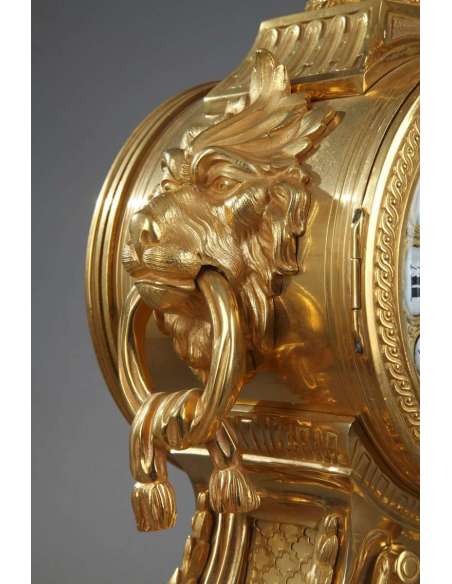 Importante garniture en bronze doré aux mufles de lion. - garnitures de cheminées-Bozaart