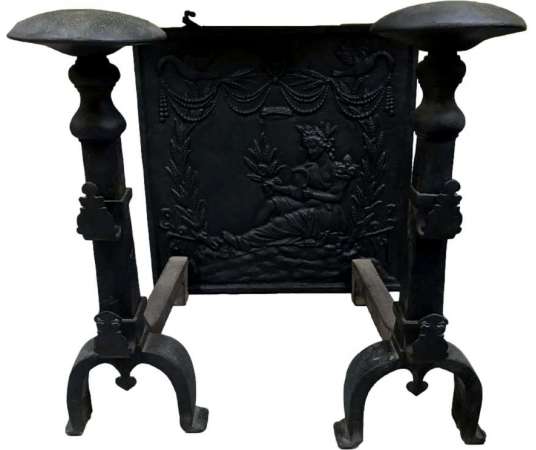 Pair of cast iron andirons from the 19th century