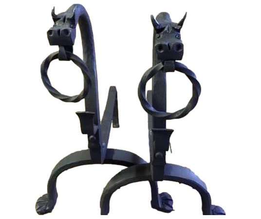 Ancient wrought iron dragon head andirons from the 20th century