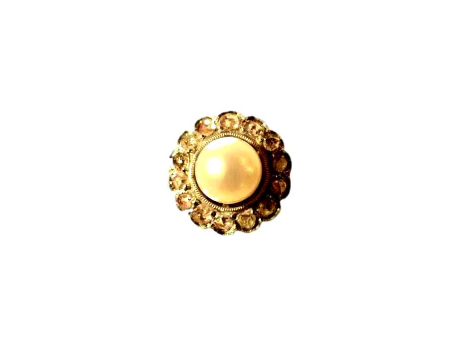 Gold And Platinum Ring Adorned With A Pearl And Diamonds