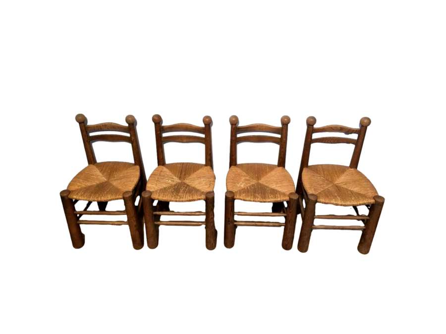 Charles Dudouyt: Suite of 4 chairs+ in wood.Circa 1960