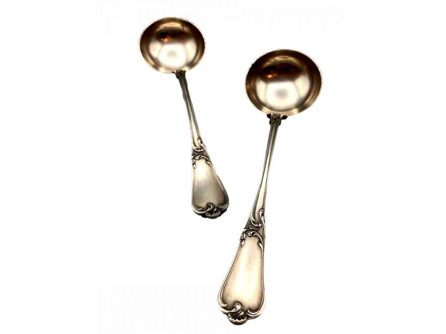 Pair of 19th century silver cream spoons