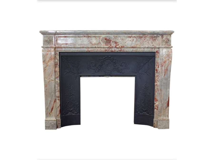 Beautiful ancient Louis XVIstyle fireplace in sarrancoline marble from XIX th century