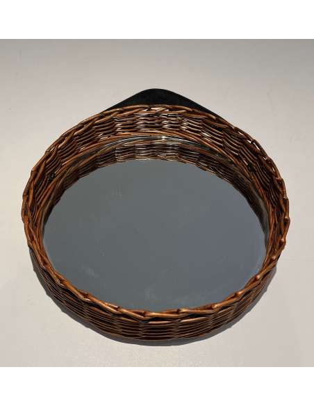 Vintage round mirror in leather and rattan from the 20th century-Bozaart