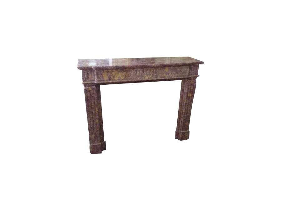 Beautiful antique Louis XVI style fireplace dating from the end of the 19th century in purple brocatelle marble