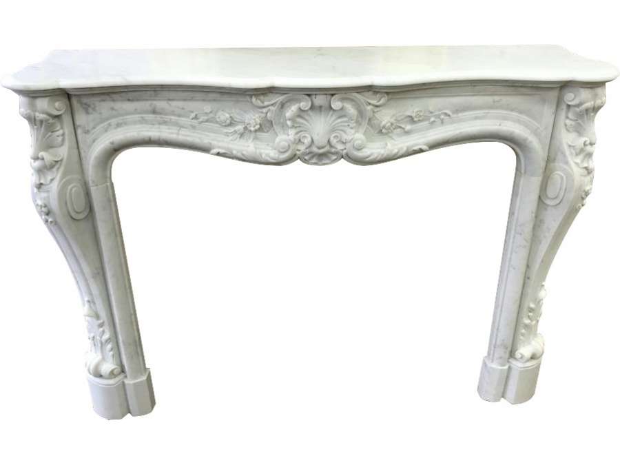 Ancient Louis XV style fireplace in white carrare marble from the 19th century