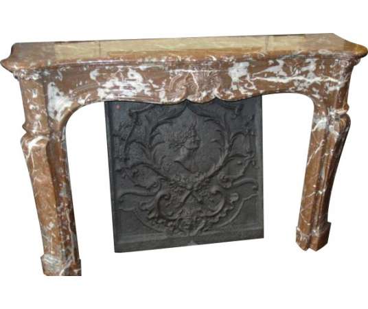 Antique Louis XV period fireplace in belgian red marble.