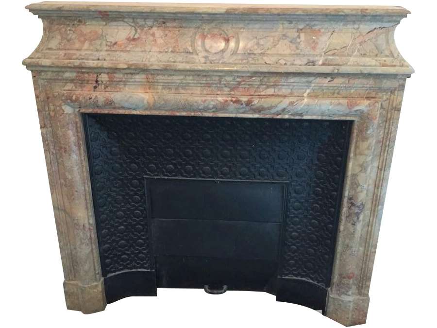 Ancient Louis XIII style fireplace dated from the 19th century made in a beautiful sarancolin marble.