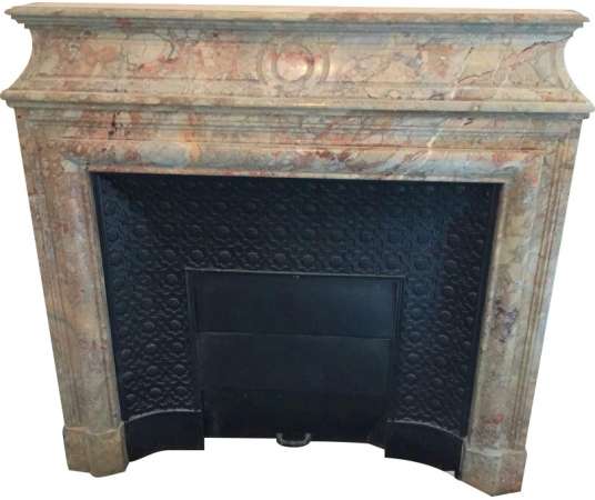 Ancient Louis XIII style fireplace dated from the 19th century made in a beautiful sarancolin...