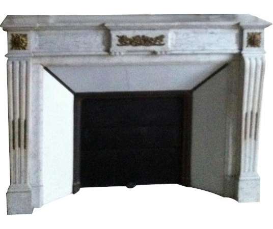 Antique louis XVI style fireplace decorated with gilded bronzes in white carrara marble late 19th...
