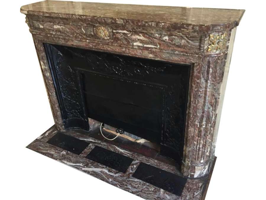 Ancient Louis XVI style fireplace in rance red marble from the XIXth century