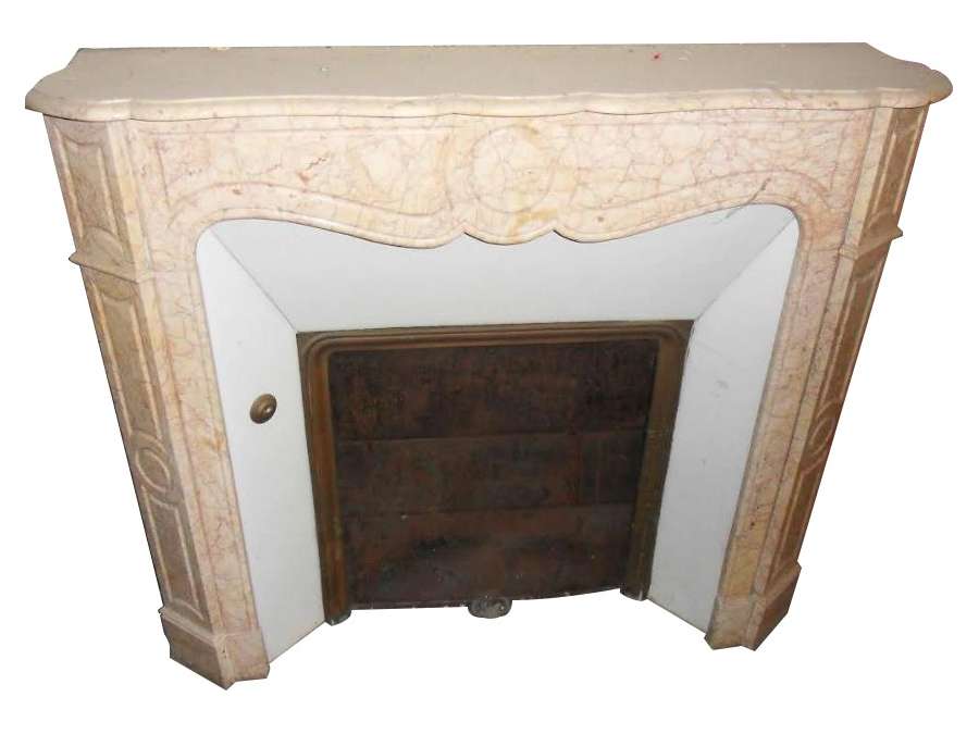 Antique pompadour style flat fireplace in yellow marble from valence