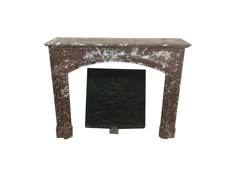 old fireplace in red marble known as boudin Louis XIV style dating from the end of the 19th century