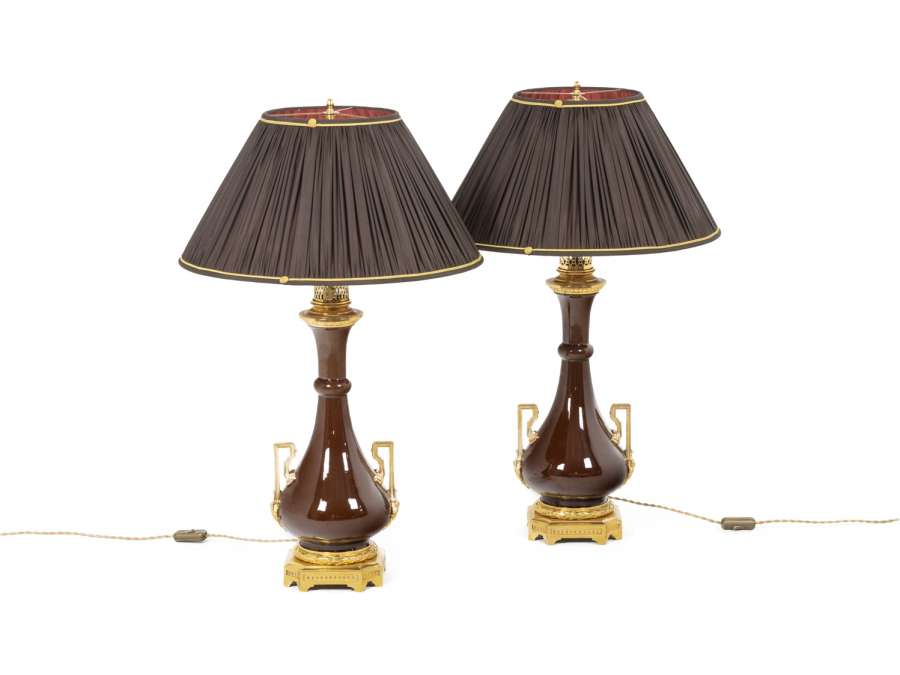 Pair of porcelain and gilt bronze lamps+ from the 19th century