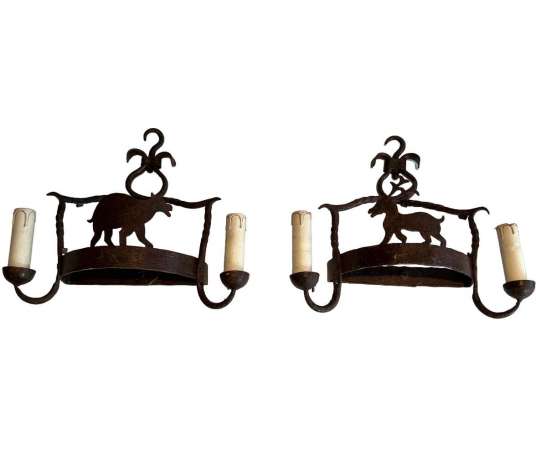 Wrought iron sconces representing animals from the 20th century