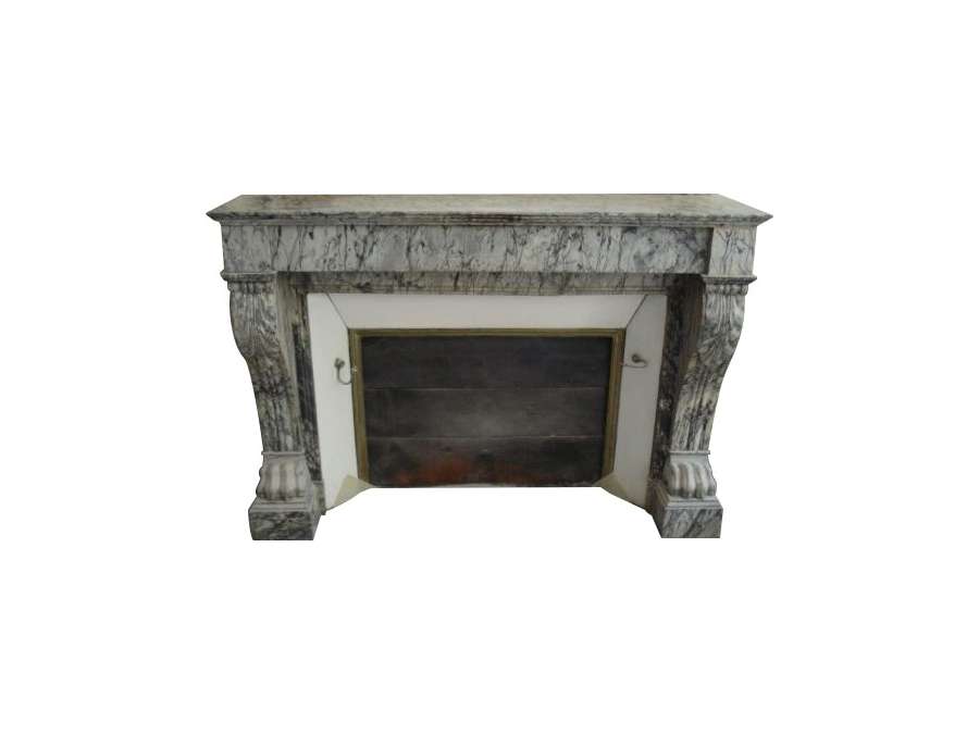 Pretty old empire style fireplace known as lion's paws dating from the end of the 19th century.