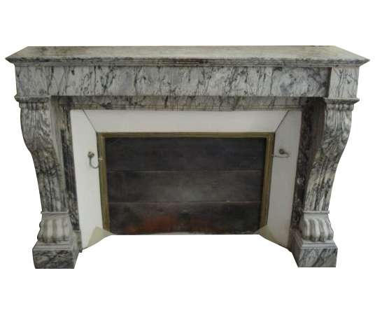 Pretty old empire style fireplace known as lion's paws dating from the end of the 19th century.