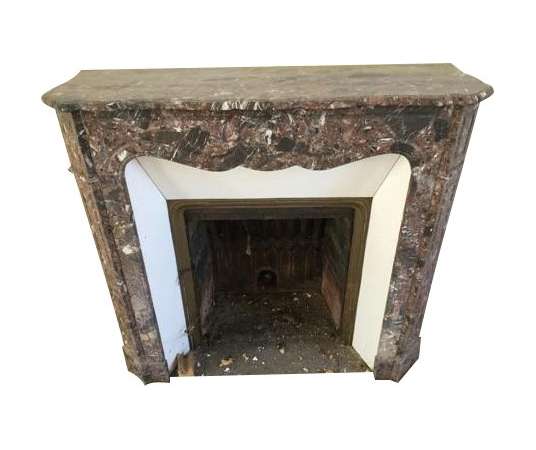 Antique Pompadour flat breche fireplace from the 19th century