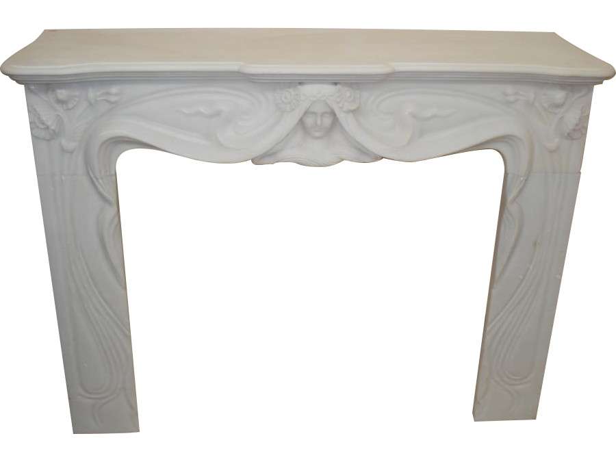 Rare art nouveau fireplace with a woman's head in statuary white marble