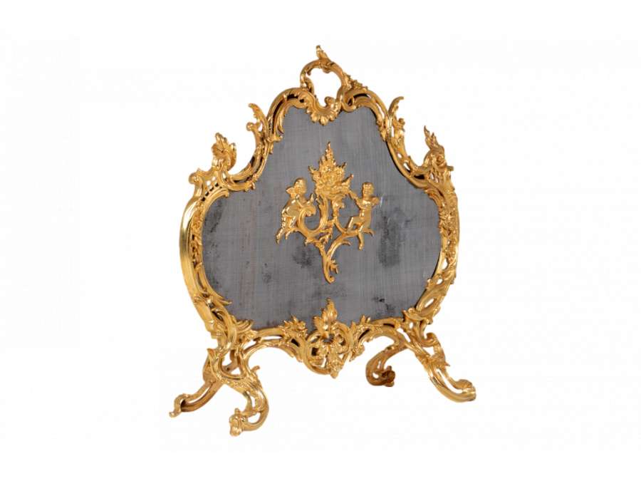 Pare-feu en bronze doré de style Louis XV. Année 1880