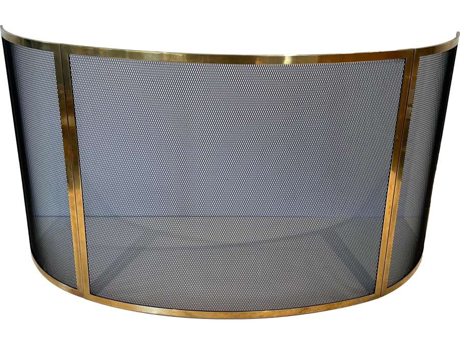 Curved brass fire screen from the 70s