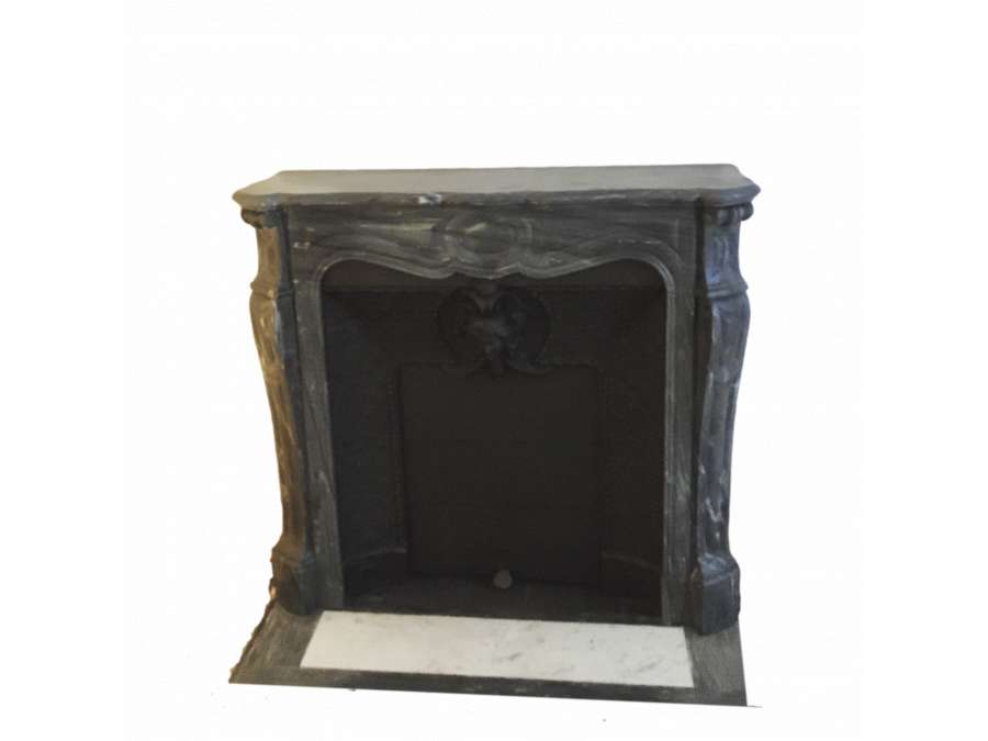 Antique late 19th century blue turquin marble fireplace known as pompadour on louis xv feet