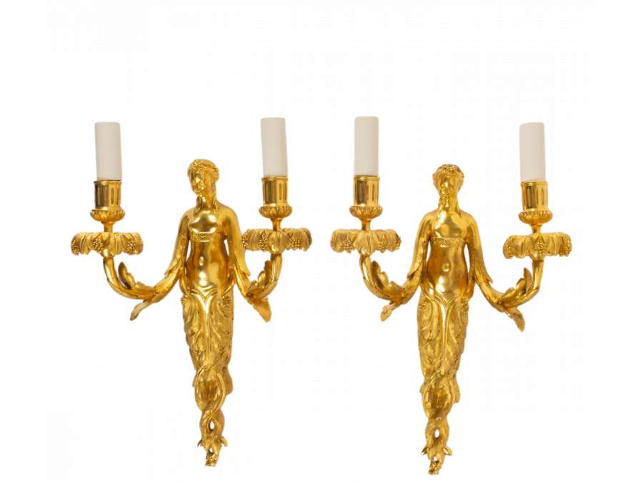 A Pair of Louis XVI style wall-lights.