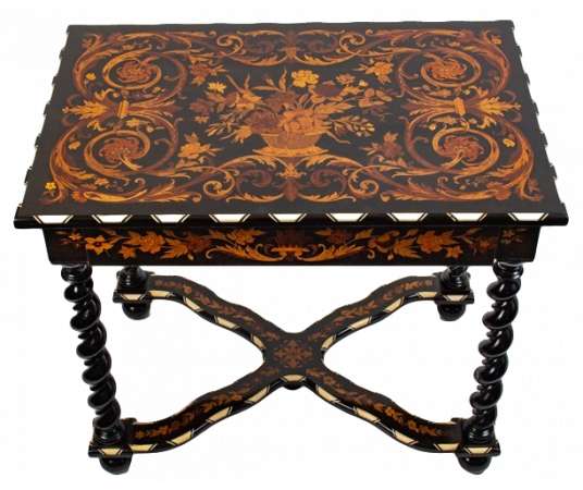 A Napoleon III period (1848 - 1870) marquetry table in Louis XIV style. 19th century.