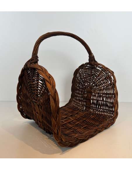 Contemporary wicker firewood holder from the 70s-Bozaart