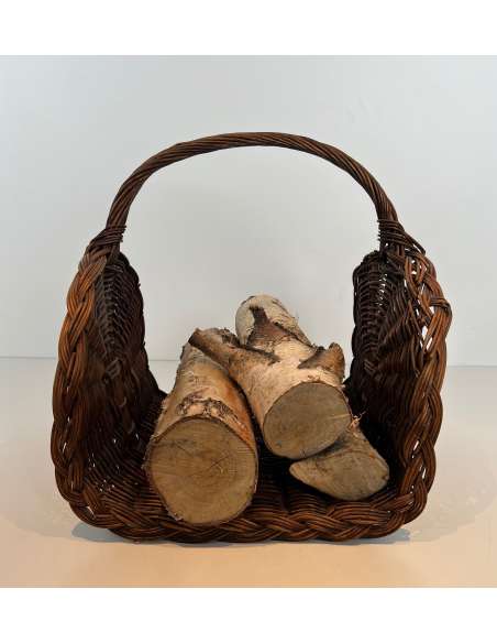 Contemporary wicker firewood holder from the 70s-Bozaart