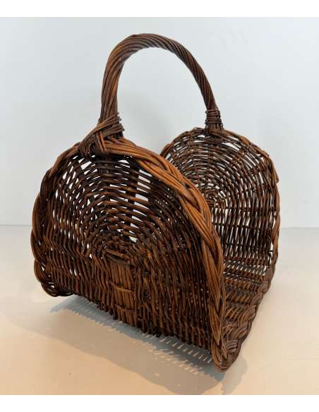 Contemporary wicker firewood holder from the 70s-Bozaart