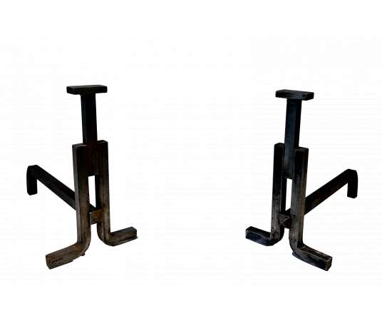 Modernist cast-iron andirons from the 1950s