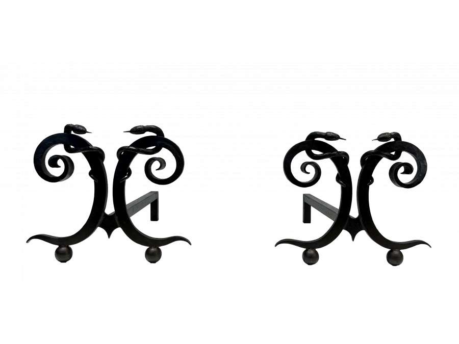 Wrought iron "Serpent" model andirons from the 50s