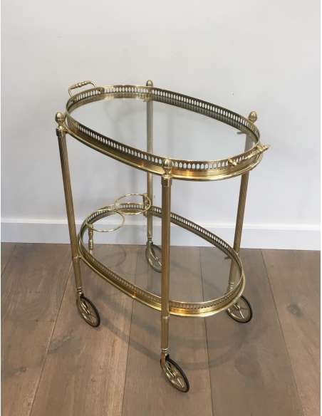 Maison Bagués, Oval brass rolling table from the 40s-Bozaart