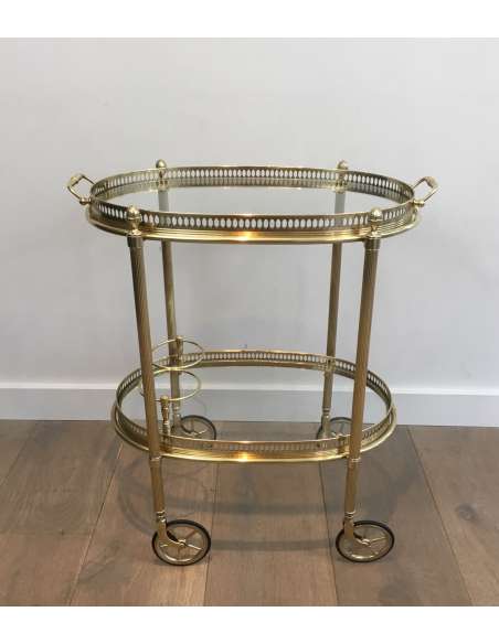 Maison Bagués, Oval brass rolling table from the 40s-Bozaart