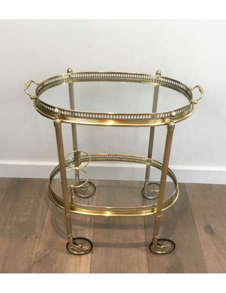 Maison Bagués, Oval brass rolling table from the 40s-Bozaart