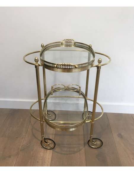 Maison Bagués, Oval brass rolling table from the 40s-Bozaart