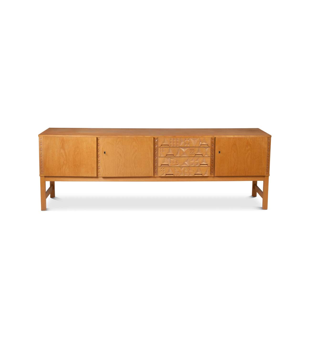 Oak and oak veneer sideboard opening to 3 doors and 4 drawers